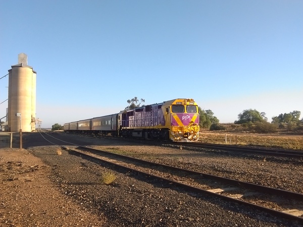 N class hauled southbound VLine / PTV passenger train at Mitiamo (Victoria) heading south towards Southern Cross, 2018.