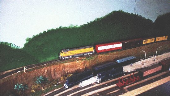 A UP U33C with a freight train