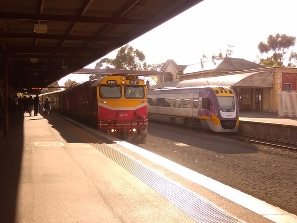 VLocity and N class deisel-elctric hauled passenger train at Bendigo (Victoria), 2018.