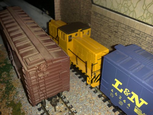 The GE44 picks up a car from the yard.
